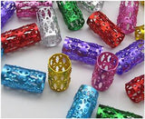 An assortment of Dreadz Long Multi Colour Adjustable 7.5mm Hole Metal Tube Dreadlock Hair Cuffs / Beads displayed on a light surface