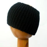 Dreadz Chunky Knitted Head Band / Tube (Black) displayed on wooden mannequin's head against white background
