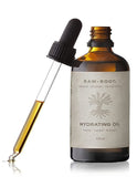 RAW ROOTs Dreadlock Hydrating Oil 100ml with oil pipette dropper lid shown rested against the side of the bottle