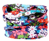 Dreadz 12 in 1 multi-function tubular Disty Floral styled, dreadlock headband, shown rolled and placed as if seen worn around the neck, displayed against a white background