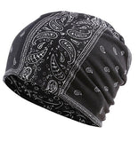 Dreadz three in one Multi Function Tubular Beanie, Headwrap, and Neckwarmer in White and Black Paisley colours shown against a white background