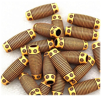 A collection of brown acrylic tribal hair beads for dreadlocks, with 6mm hole, shown grouped together on a white background