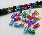 An assortment of Dreadz Long Multi Colour Adjustable 7.5mm Hole Metal Tube Dreadlock Hair Cuffs / Beads   displayed on a light surface and threaded onto synthetic dreadlocks for illustrative purposes