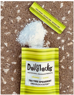 Dollylocks Tea Tree Spearmint Dreadlocks Detox Kit with open packet displaying detoxifying contents