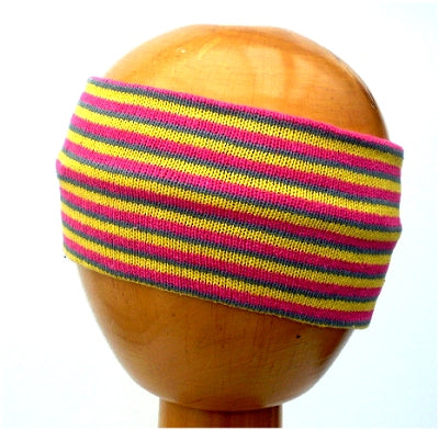 Dreadz Fair Trade Multi Coloured Striped Headband (Yellow/Purple/Pink) displayed on wooden mannequin head against plain light background