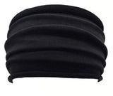 A Black, Lightweight, Stretch, Wide Headband shown displayed on white mannequin's head