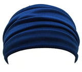 A Navy Blue, Lightweight, Stretch, Wide Headband shown displayed on white mannequin's head