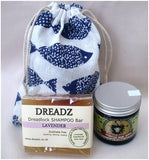 Mane Tamer Dreadlock Wax and Dreadz Lavender Dread Shampoo Bar DUO Pack Combo Kit (Style 4) shown against blue fish printed drawstring bag